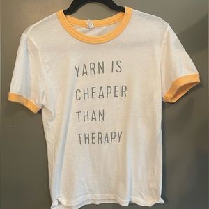 Alternative baseball style tee shirt saying yarn is cheaper than therapy size xs